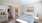 bedroom with closet and bathroom
