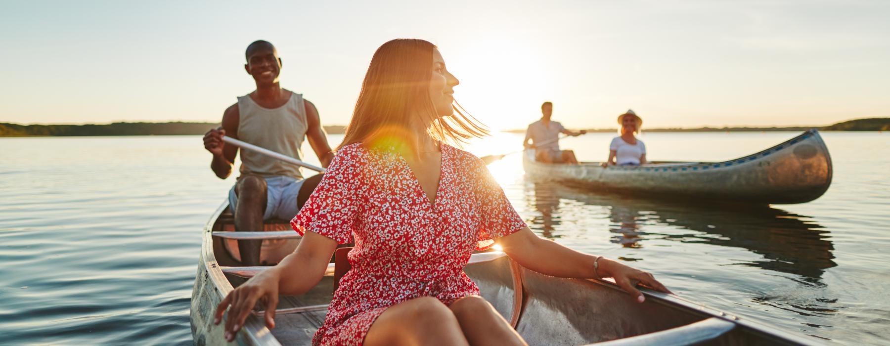 a group of people on boats