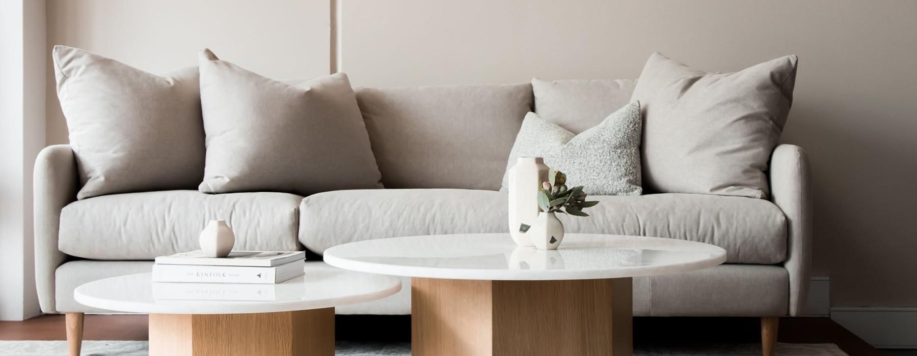 a white couch with a coffee table