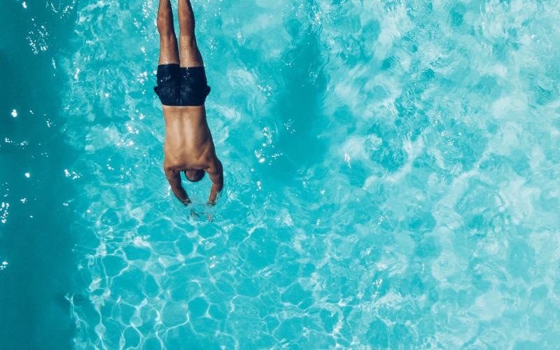 a man swimming in the water